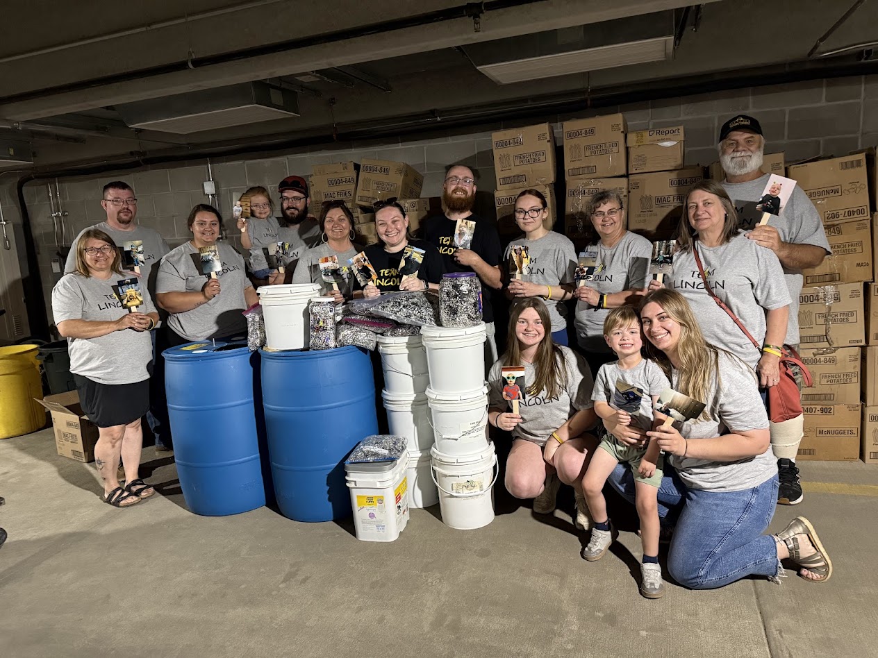 Group photo at Ronald McDonald House pop tab donation